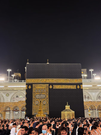Pilgrims performing tawaf around the Kaaba at Masjid al-Haram in Mecca during night prayer