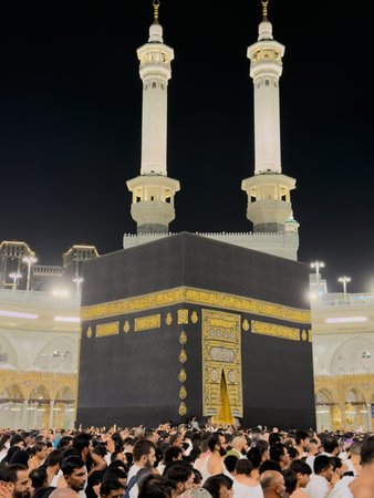Pilgrims circumambulating the Kaaba at Masjid al-Haram in Mecca during Hajj pilgrimage at night