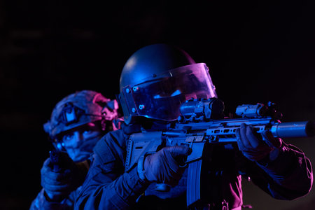 Tactical Police SWAT Team With Helmet Visor and Rifle Conducting Night Operation