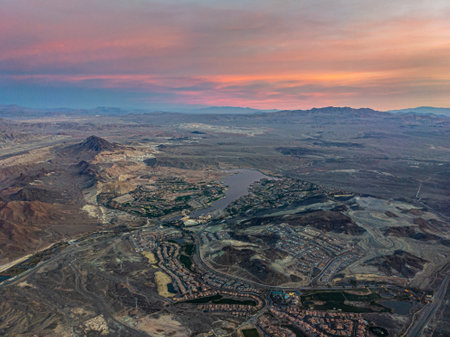 Aerial sunrise view of city edge of Las Vegas, Nevada on cloudy dayの写真素材