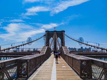 Brooklyn Bridge on bright summer day in New York Cityのeditorial素材
