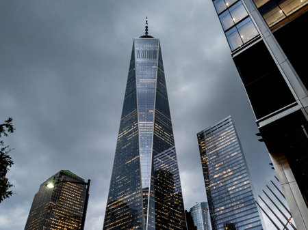 Looking up at One World Trade Center in Manhattan, New York City on dark cloudy nightのeditorial素材