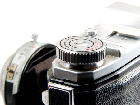 Old camera. Closeup, on white backgroundの写真素材