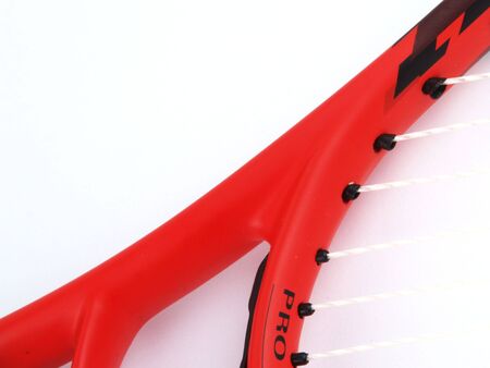 Part of tennis racket close up on white backgroundの写真素材