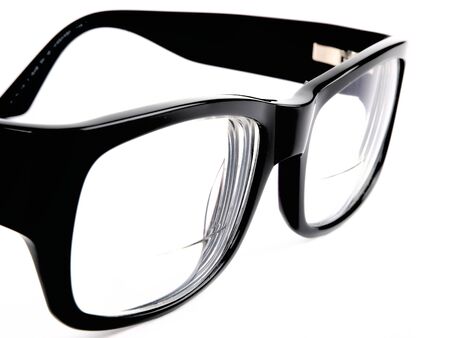 Black retro eyeglasses. Close up on white background の写真素材