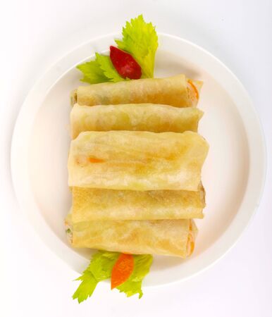 Chinese spring roll. Close up on white background の写真素材