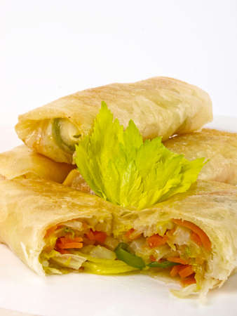 Chinese spring roll. Close up on white background の写真素材