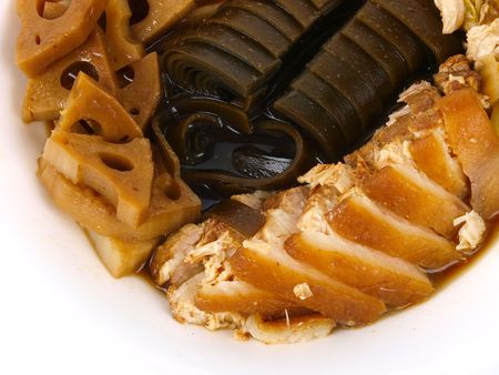 Chinese vinegar stued dish. Close up on white background の写真素材