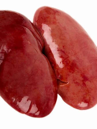 Pig kidney. Close up on white backgroundの写真素材
