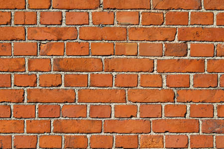 Red brick wall. Close up. From an old houseの写真素材