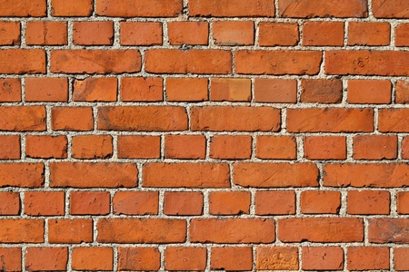 Red brick wall. Close up. From an old houseの写真素材