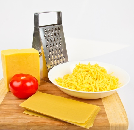 grated cheese and graterの写真素材