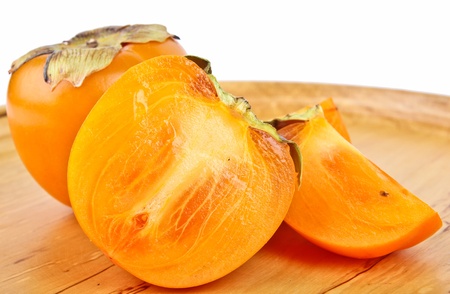 persimmon. Close up on white backgroundの写真素材