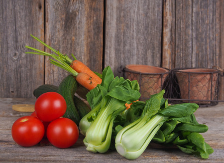 Autumn harvest of cabbage and tomatoesの写真素材