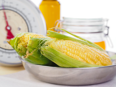 corn on a kitchen scaleの写真素材