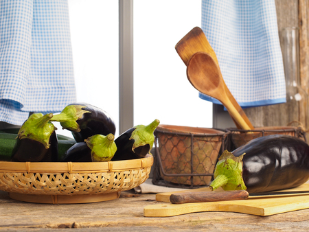 Eggplants on a kitchen tableの写真素材