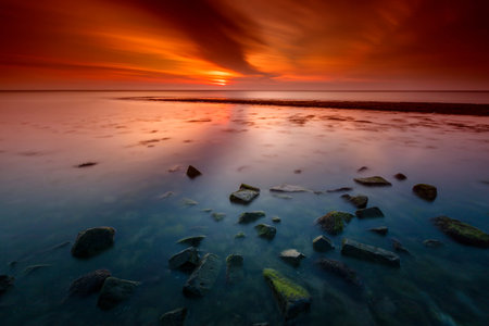 Sea Breakwater Sunset in Long Exposure
