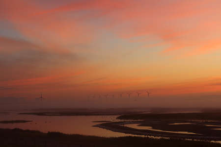 Beautiful sunrise in The Netherlands shot from above with a drone.の写真素材