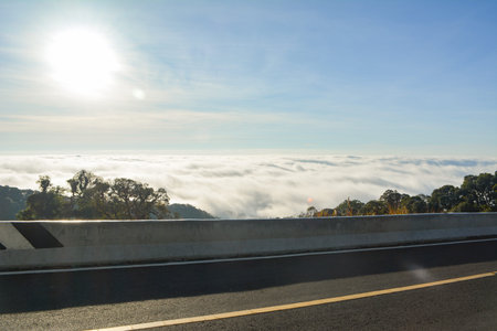 Mountain forest sun cloudの写真素材