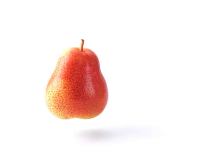 Ripe pear floating on white backgroundの写真素材