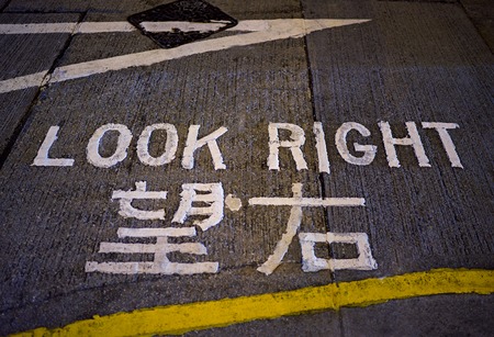 Look right sign at night. Hong Kongの写真素材