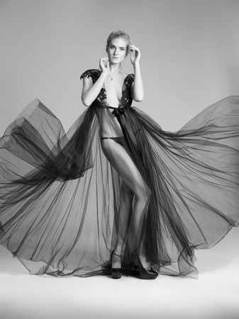 Beautiful nude woman posing in studioの写真素材