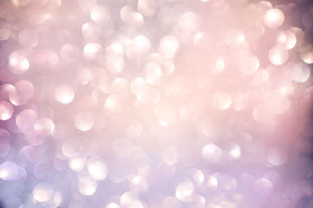vintage pink and purple bokeh light festive Christmas and New Year backgroundの写真素材