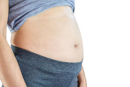 fat woman with big belly  ,overweight or diet concept isolated on white backgroundの写真素材