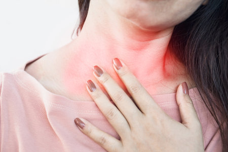 Asian woman suffering from acid reflux or heartburnの写真素材