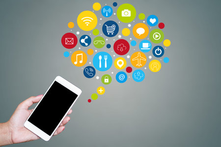 hand holding smart phone with social media icon, networking, internet of thing concept background