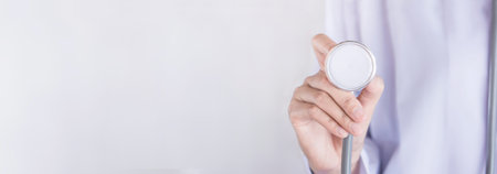 male doctor hand holding stethoscope ,healthcare and medical concept background