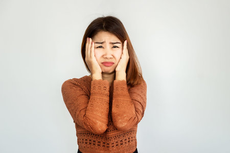 sad Asian woman with angry face panic disorder concept
