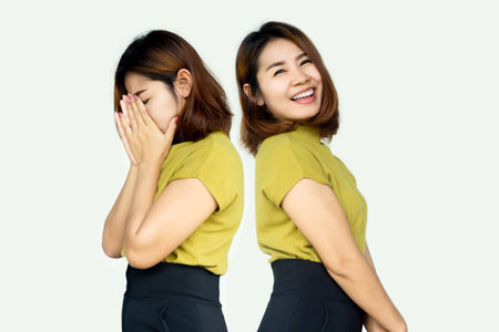 Asian woman having problem with two personality or bipolar with difference face  moody, sad and...