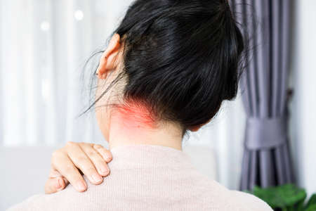 woman suffering from neck back,  occipital painの写真素材