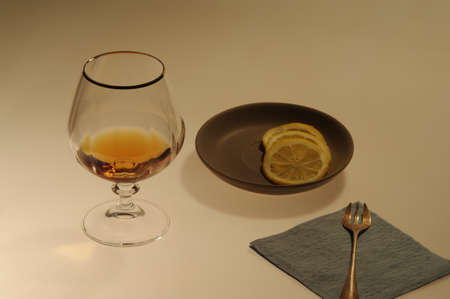 Cognac  with  lemonの写真素材