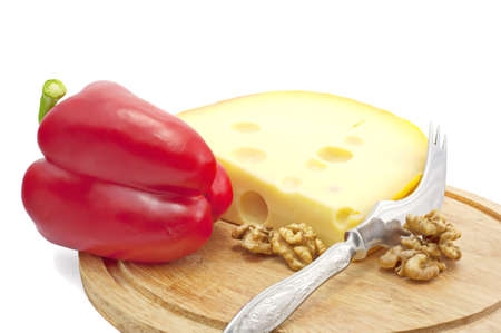 Some of cheese, red pepper and dry nuts isolated の写真素材