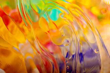 Oil drops on a water surface の写真素材