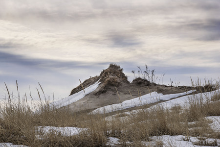 snow covered dunes in new englandの写真素材
