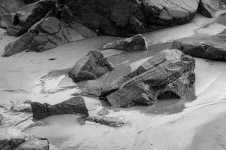 water flowing back to the ocean during low tideの写真素材
