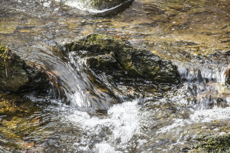 water cascading over a small stream in new englandの写真素材