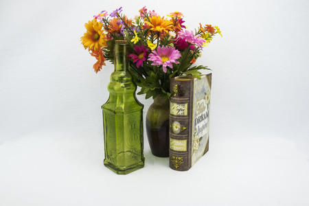 assorted flowers with a bookの写真素材