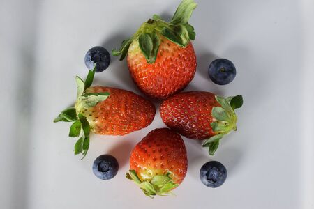 strawberries and blueberriesの写真素材