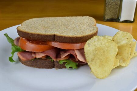 bacon lettuce tomato on wheat breadの写真素材