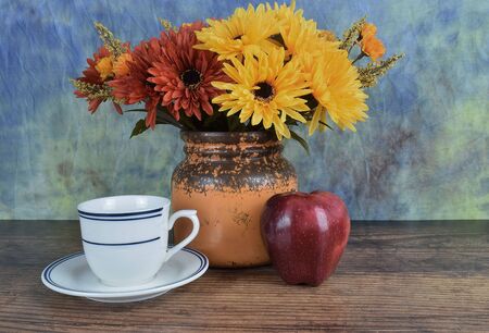 cup of tea with an appleの写真素材