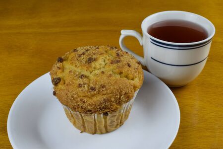 cup of tea with coffee cake muffinの写真素材