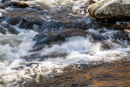 close of cascading water of willard brook in willard brook state forest