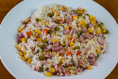 white rice served with  corn , peas and carrots,の写真素材