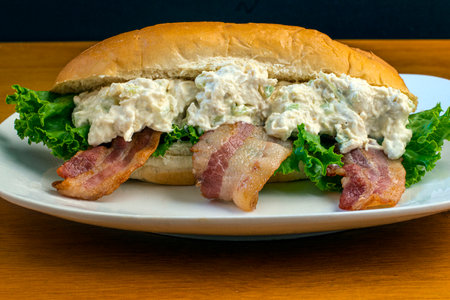 chicken salad  with bacon  and lettuce served on a subの写真素材