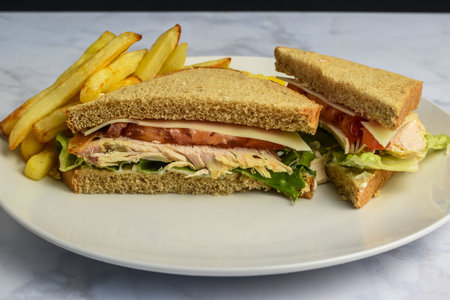 chicken sandwich serve with  a side of french friesの写真素材