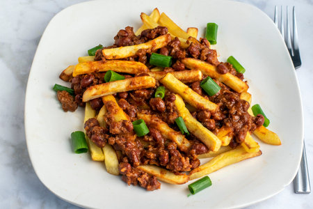 french fries top with  chilli  and green onions, french fries, fries,